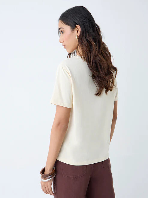 Relaxed Fit Light Yellow Printed Cotton T Shirt Ideal for Daily Wear and Street Style