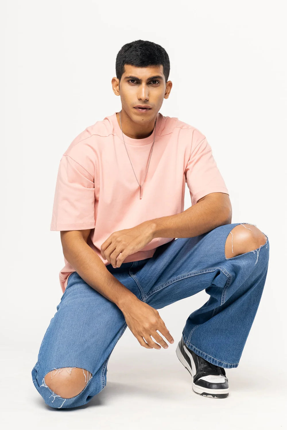 Casual Men’s Blue Jeans with Straight Fit, Baggy Style, and Knee Slit