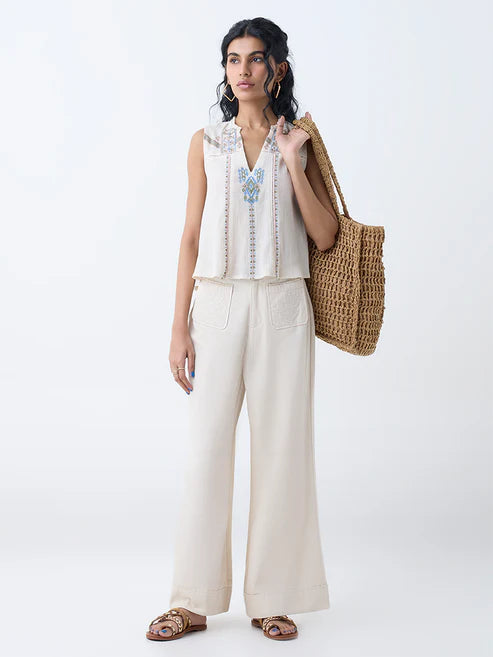 Graceful Women Off White Embroidered Cotton Top for Casual and Festive Wear
