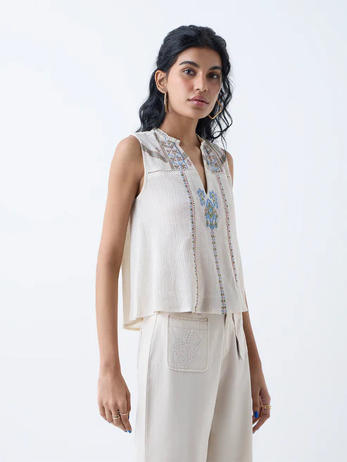 Graceful Women Off White Embroidered Cotton Top for Casual and Festive Wear